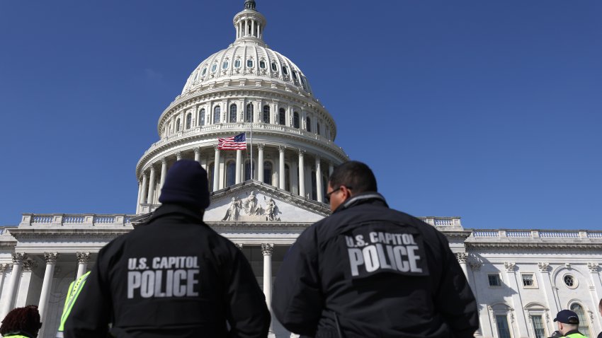 WASHINGTON, DC – FEBRUARY 28: U.S. Capitol police officers gather on the east front plaza of the Capitol on February 28, 2022 in Washington, DC. Security has been heightened and fencing was erected around the U.S. Capitol ahead of U.S. President Joe Biden’s State of the Union address on Tuesday evening. (Photo by Justin Sullivan/Getty Images)