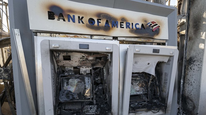 LOS ANGELES, CA, UNITED STATES – JANUARY 15: A Bank of America ATM machine burned from the Palisade Fire in Pacific Palisades, California on January 15, 2025. (Photo by Jon Putman/Anadolu via Getty Images)