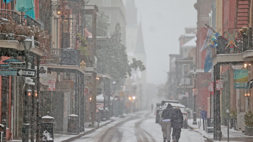 NEW ORLEANS, LOUISIANA – JANUARY 21: Snow falls on Chartres Street in the French Quarter on January 21, 2025 in New Orleans, Louisiana. A winter storm brought rare snowfall to the city shutting down schools and businesses and drawing out locals, many of whom had never seen snow before. (Photo by Michael DeMocker/Getty Images)