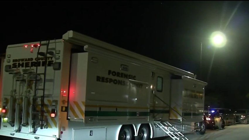 A Broward Sheriff’s Office vehicle responds after three people were found dead in a Pompano Beach home on March 19, 2025.
