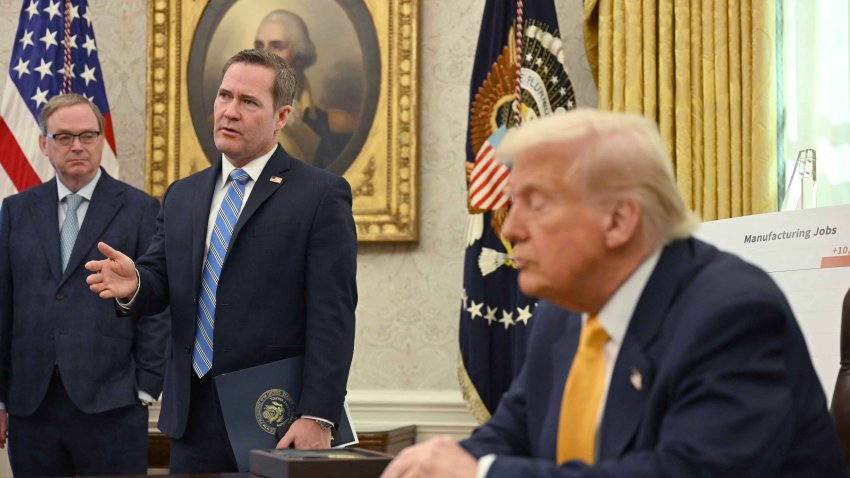 US President Donald Trump listens to National Security Advisor Mike Waltz (C) as he speaks from the Oval Office of the White House in Washington, DC, on March 7, 2025. Trump on Friday said tariffs could be imposed on Canadian dairy and lumber products within days, in a growing trade war with the United States’ northern neighbor. (Photo by Jim WATSON / AFP) (Photo by JIM WATSON/AFP via Getty Images)