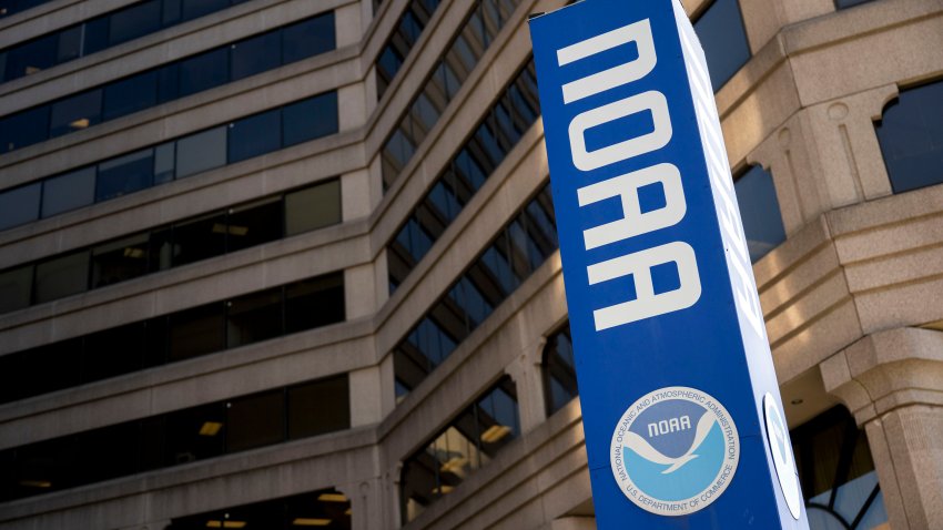 Signage outside the National Oceanic and Atmospheric Administration (NOAA) headquarters in Silver Spring, Maryland, US, on Monday, March 3, 2025. The Trump administration fired hundreds of employees at the top US agency overseeing weather prediction and climate research, raising concerns about the nation’s preparedness amid wildfire and tornado warnings. Photographer: Daniel Heuer/Bloomberg via Getty Images