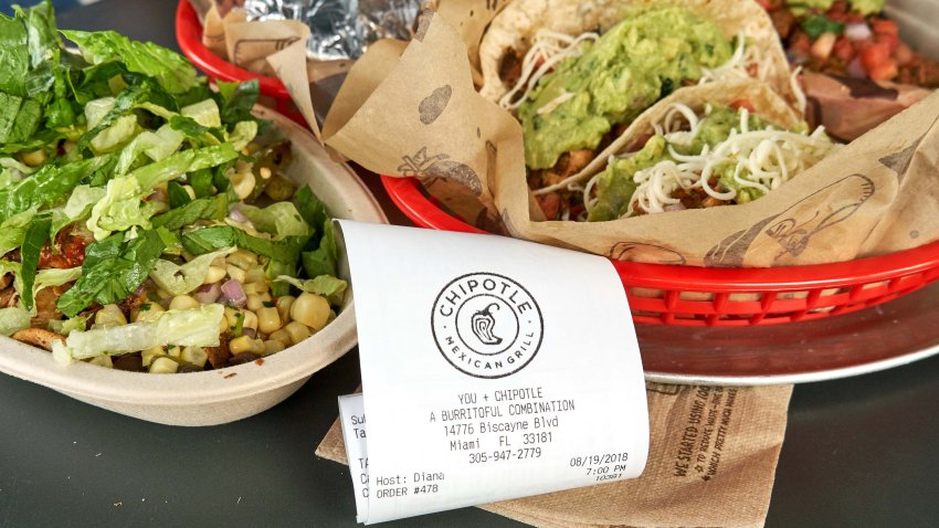 MIAMI, USA – AUGUST 22, 2018: Chipotle plate and receipt. Chipotle restaurant logo. Chipotle Mexican Grill is an American chain of fast casual restaurants