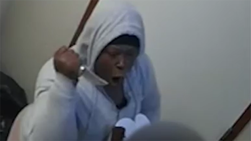 Detectives are searching for a knife-wielding woman who was caught on camera threatening a worker in a Pompano Beach restaurant.
