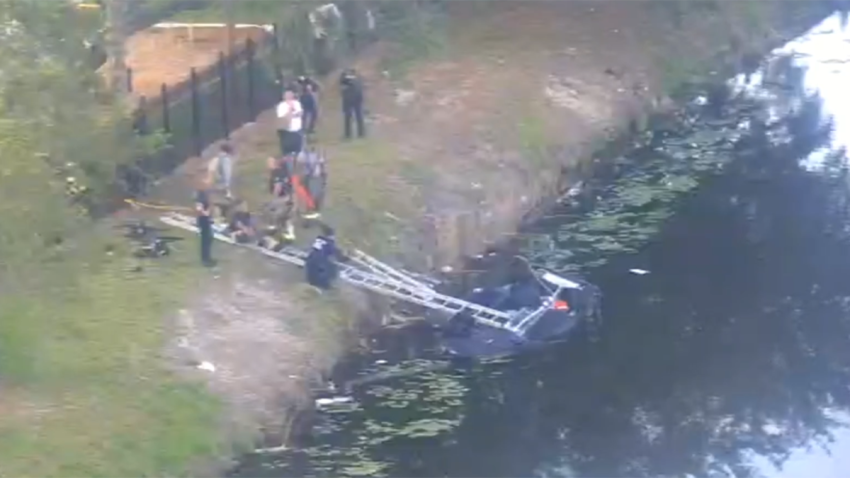 Crews were responding after a car crashed into a canal in Pompano Beach Thursday morning.