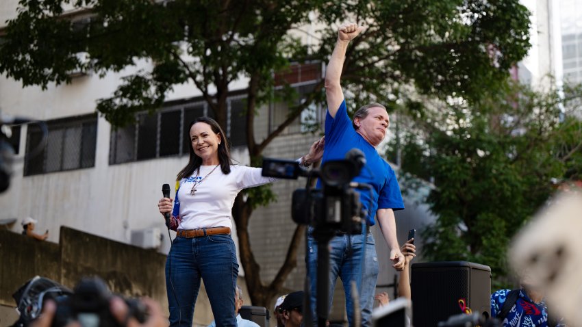 CARACAS, VENEZUELA – JANUARY 9: Opposition Leader Maria Corina Machado and Juan Pablo Guanipa participate during an anti-government protest on January 9, 2025 in Caracas, Venezuela. According to information shared by the Vente Venezuela Party, Machado was intercepted by government forces deployed by president Nicolas Maduro after finishing her participation in the rally. (Photo by Alfredo Lasry R/Getty Images)
