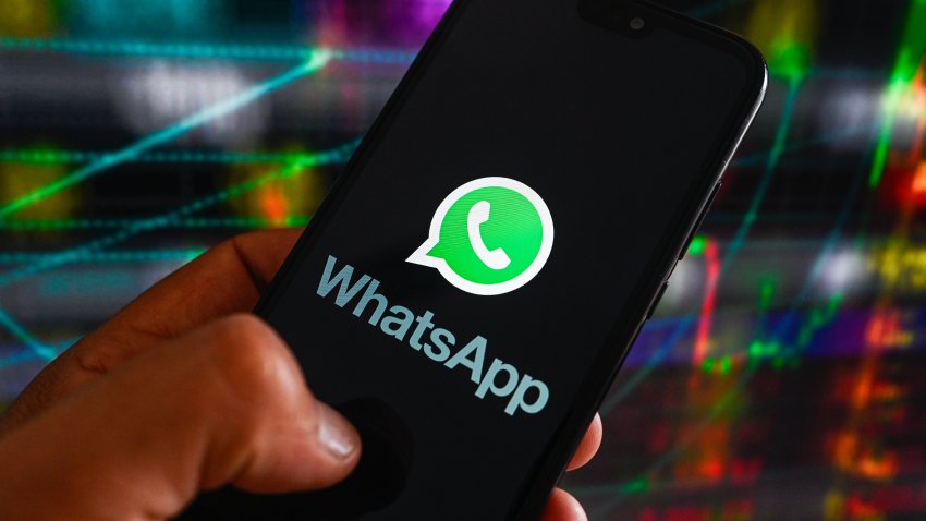 POLAND – 2023/07/06: In this photo illustration, the WhatsApp logo displayed on a smartphone with stock market percentages in the background. (Photo Illustration by Omar Marques/SOPA Images/LightRocket via Getty Images)