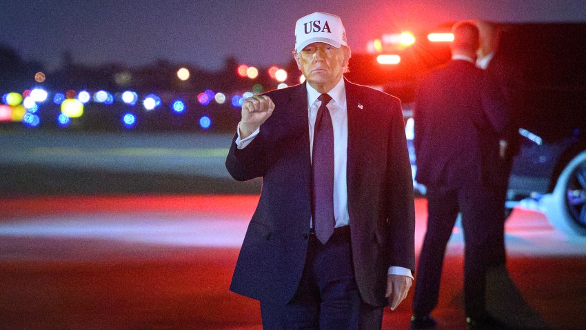 President Donald Trump gestures as he arrives at Palm Beach International Airport in West Palm Beach, Florida on February 27, 2026.