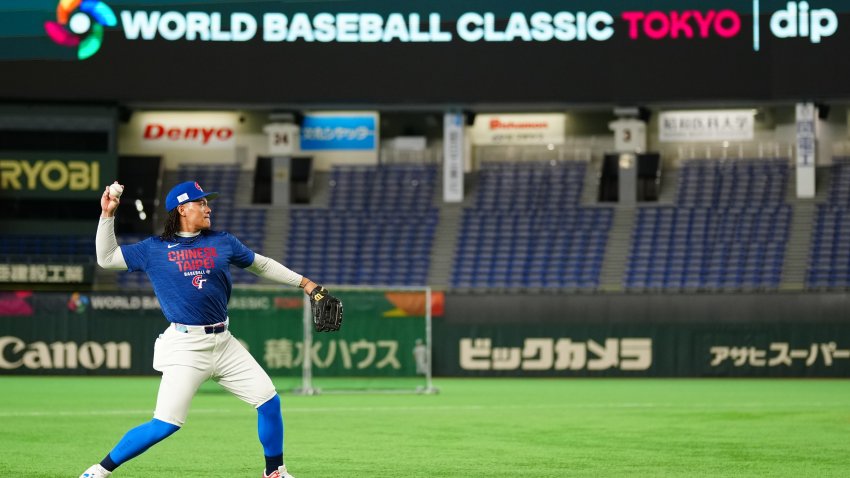 TOKYO, JAPAN – MARCH 04:  Yu Chang #18 of Team Chinese Taipei throws the ball during the 2026 World Baseball Classic workout day at Tokyo Dome on Wednesday, March 4, 2026 in Tokyo, Japan. (Photo by Daniel Shirey/WBCI/MLB Photos via Getty Images)