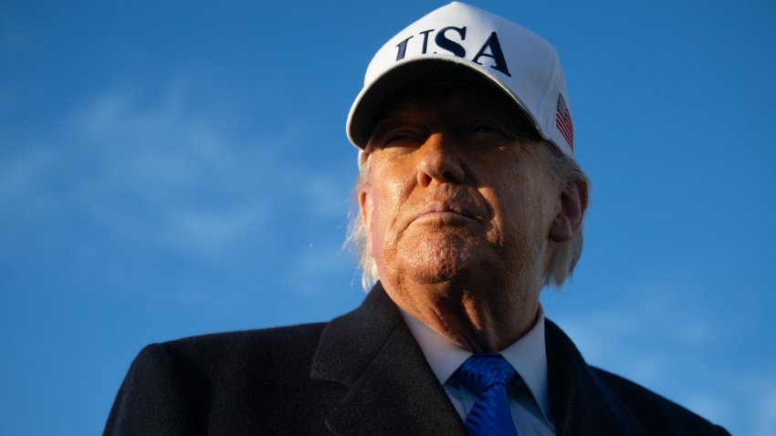 US President Donald Trump speaks to reporters before boarding Air Force One as he departs Joint Base Andrews in Maryland on March 13, 2026. President Trump is heading to Florida to spend the weekend at his Mar-a-Lago resort. (Photo by SAUL LOEB / AFP via Getty Images)