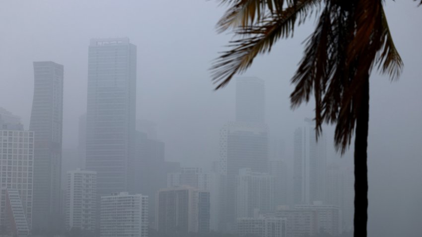 MIAMI, FLORIDA – APRIL 10: A rain squall passes over the skyline on April 10, 2023 in Miami, Florida. Reports indicate that there is almost $1.5 trillion of U.S. commercial real estate debt due for repayment before the end of 2025. The debt is causing concern for the banking sector that holds the loans. (Photo by Joe Raedle/Getty Images)