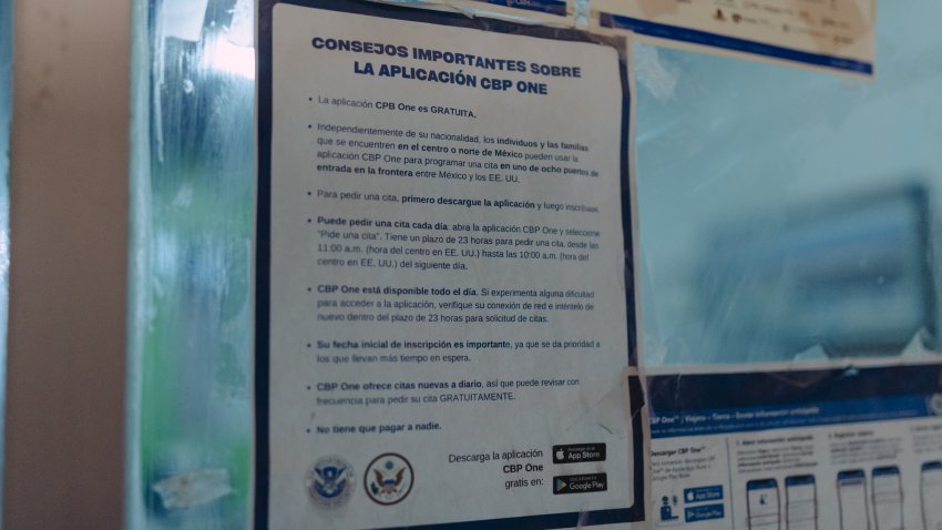 A sign about the now-eliminated CBP One app at a deportee shelter that Mexico’s government is setting up near the border wall in Ciudad Juarez, Mexico, on Wednesday, Feb. 5, 2025. Stranded migrants and a foreign-aid freeze are squeezing Mexican cities that are also anticipating the arrival of deportees. Photographer: Mariceu Erthal/Bloomberg via Getty Images