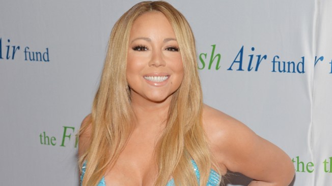 Mariah Carey vestida de gala en el subte